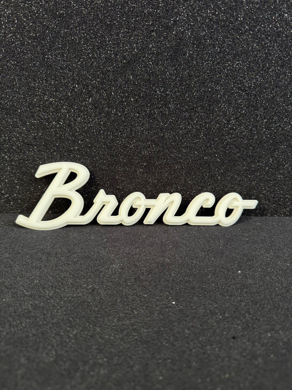 Bronco script badge
