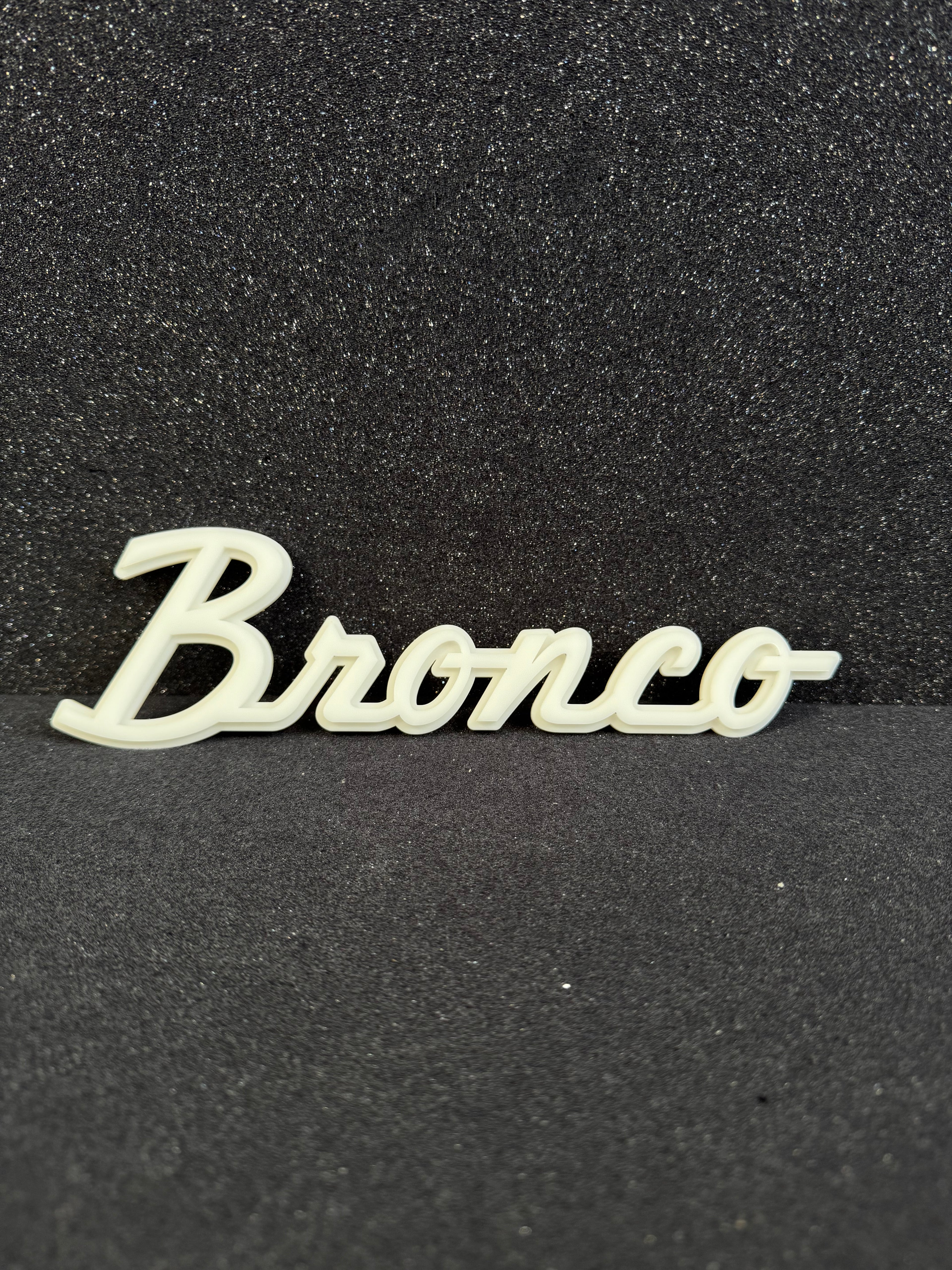 Bronco script badge