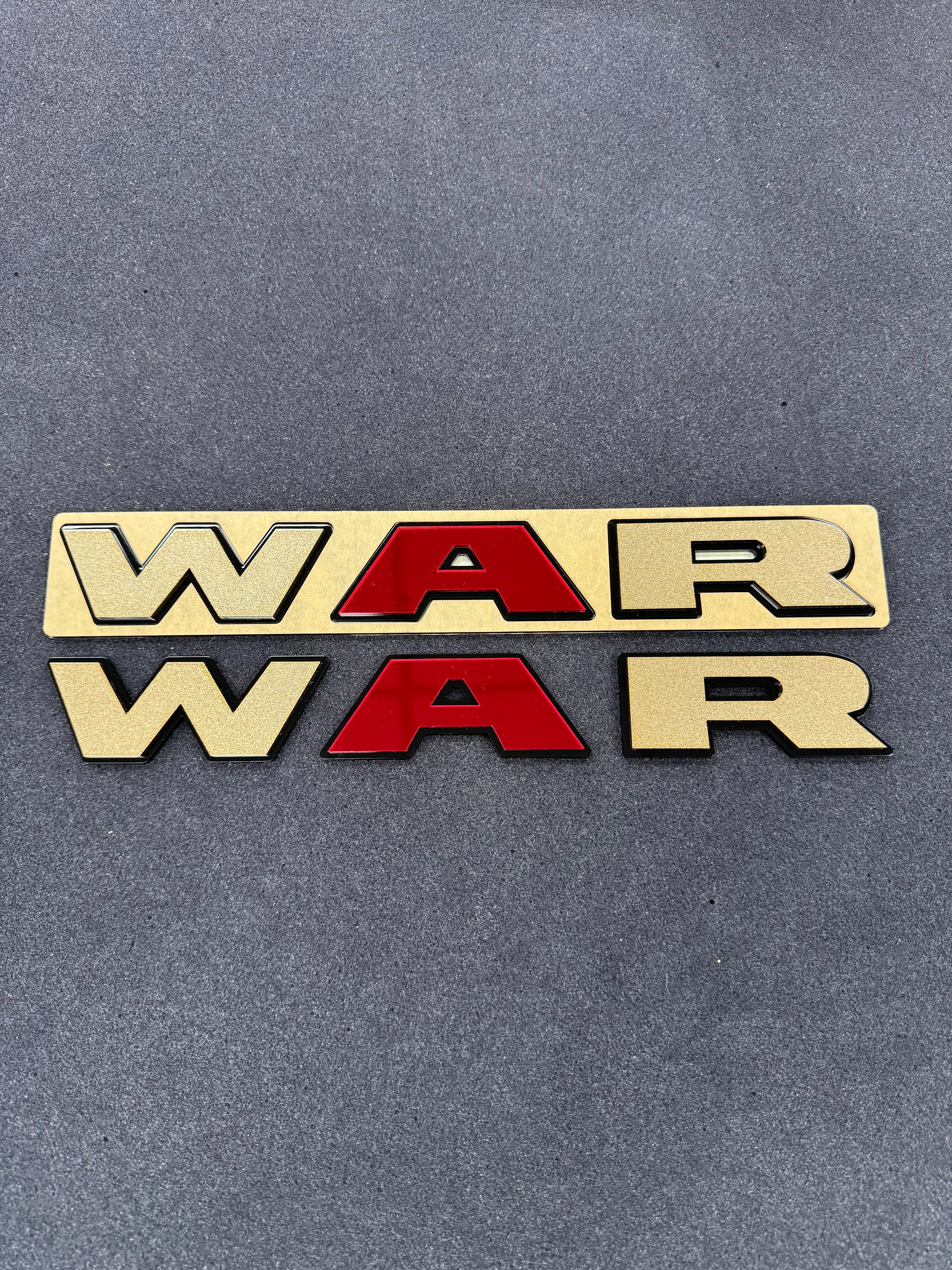 WAR door badge pair