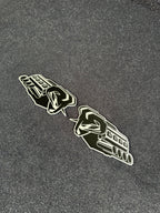 RAM's "symbol of protest" V8 badge pair