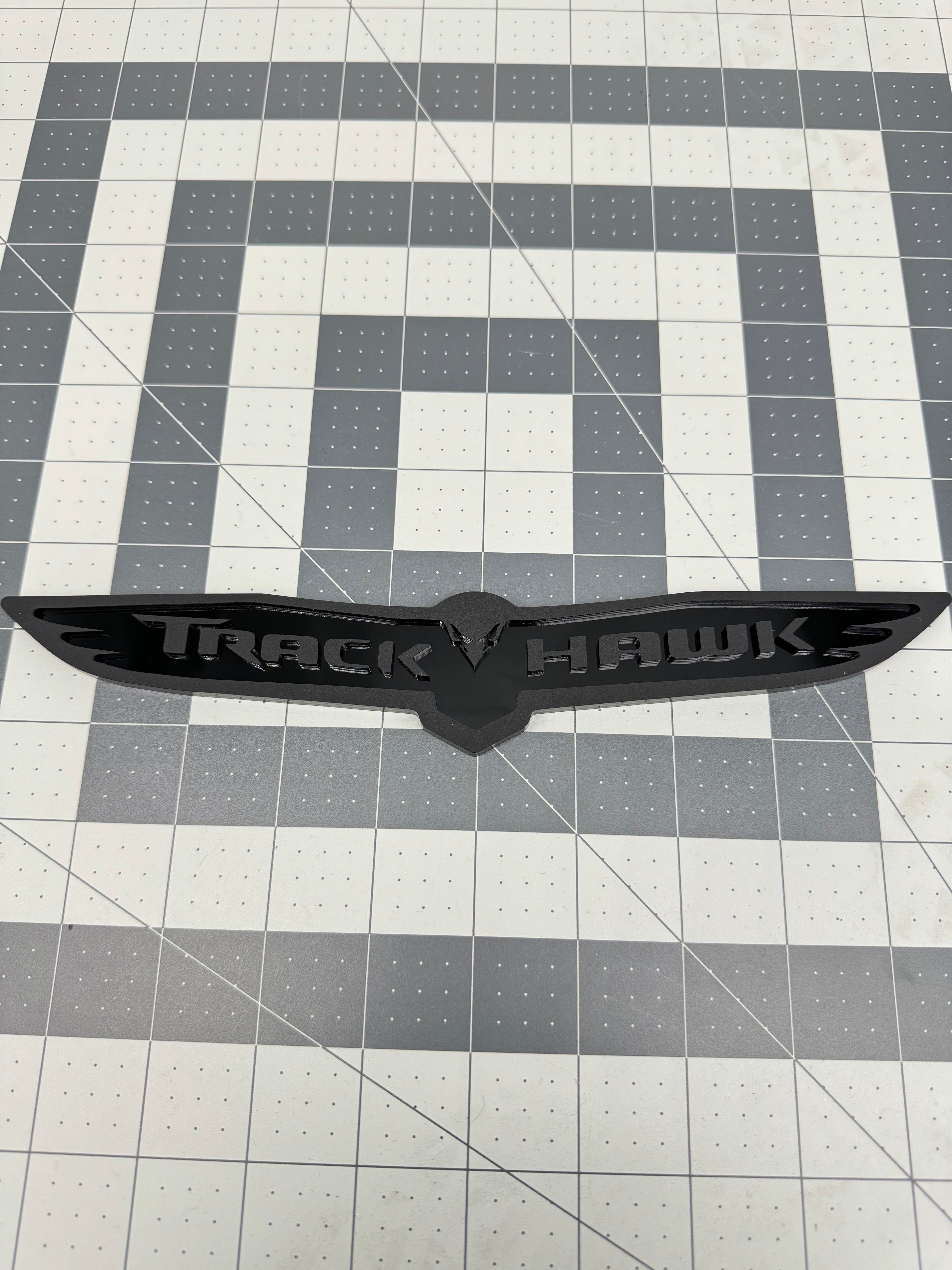 Trackhawk trunk badge