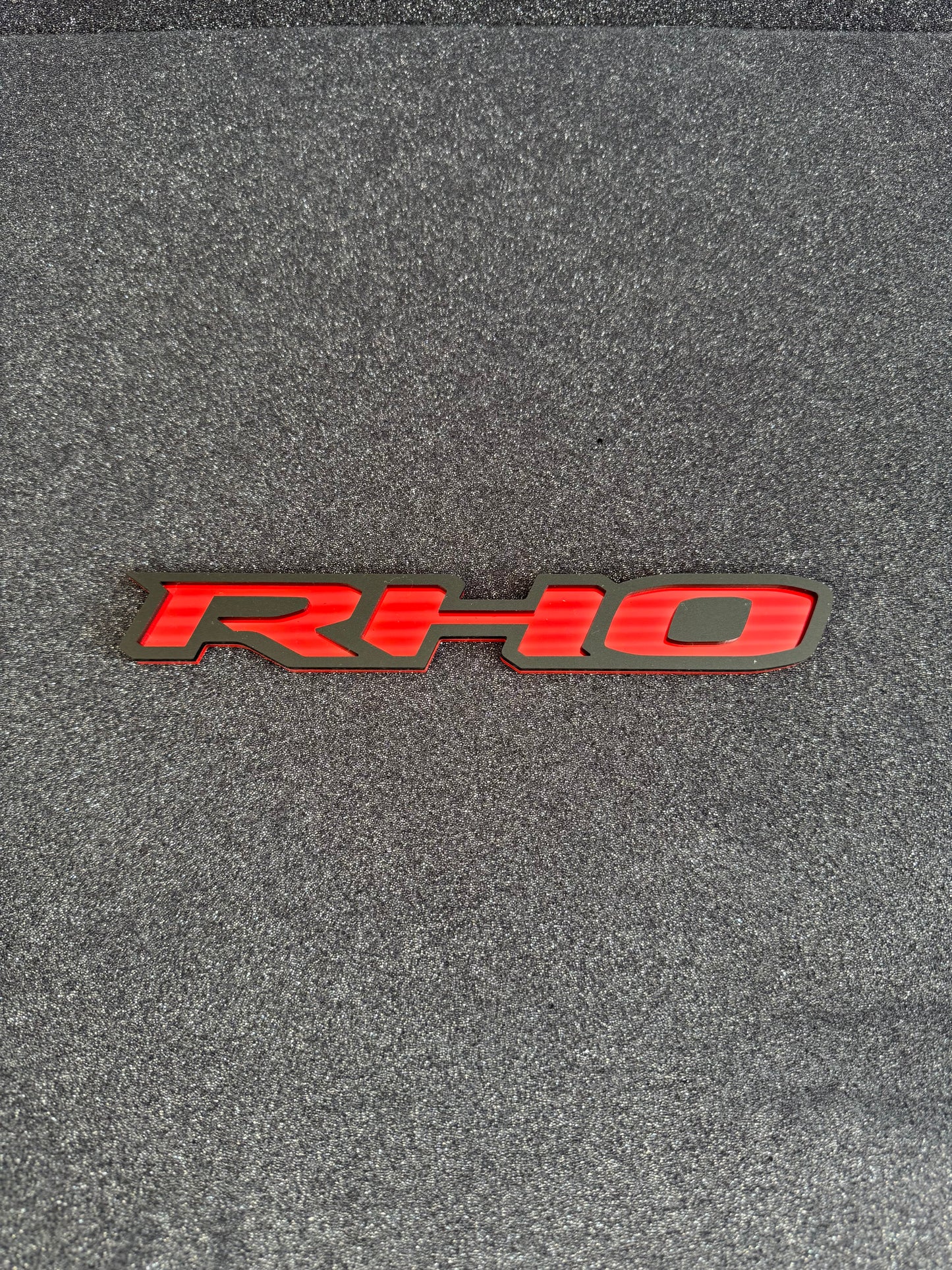 RHO small grille badge