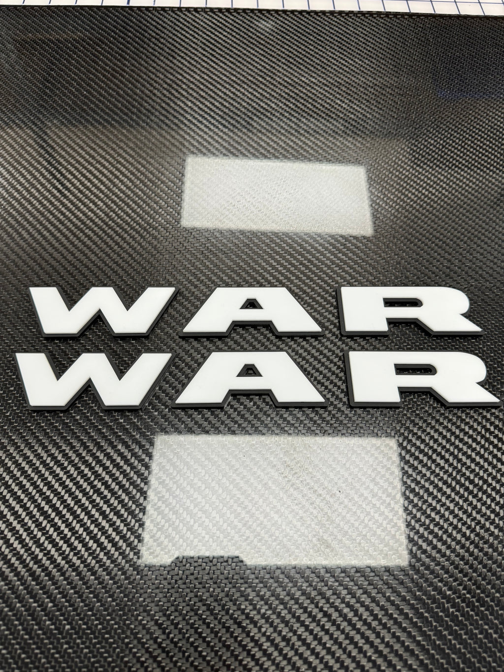WAR door badge pair
