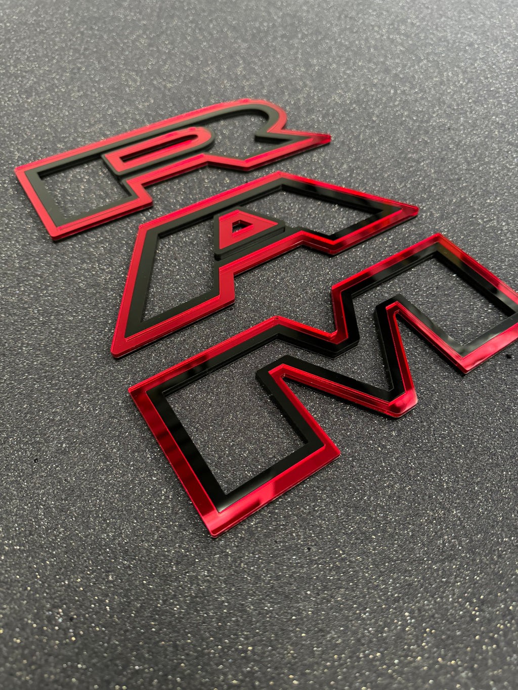 Color matched 3D RAM grille letters