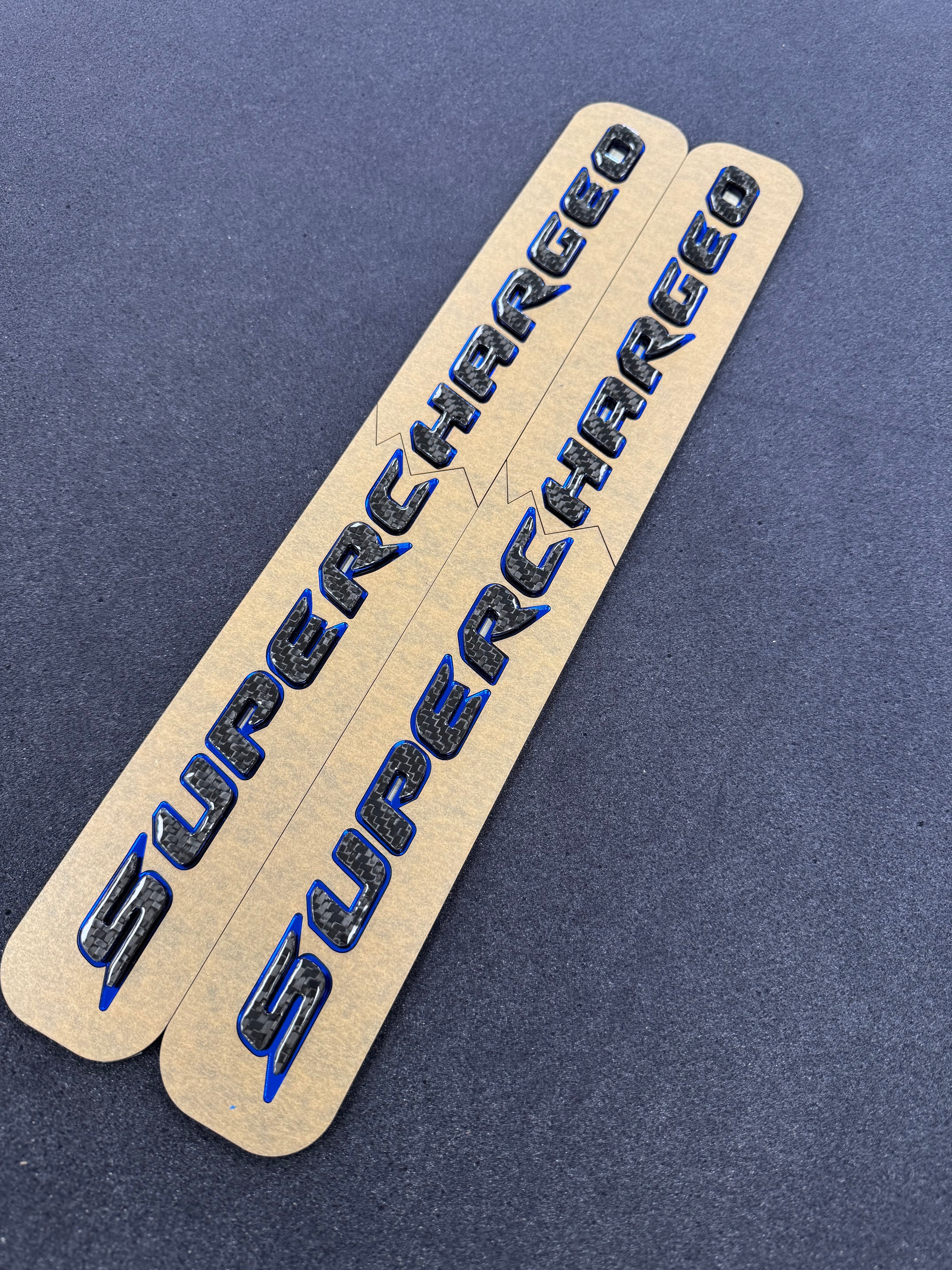 Trackhawk supercharged badge pair