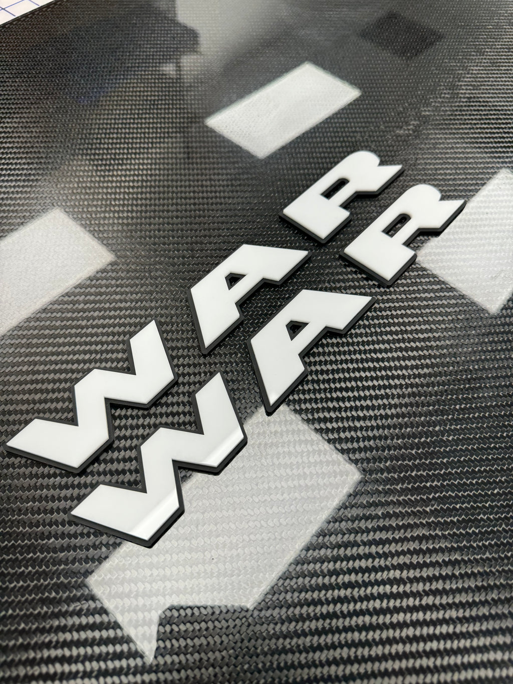 WAR door badge pair