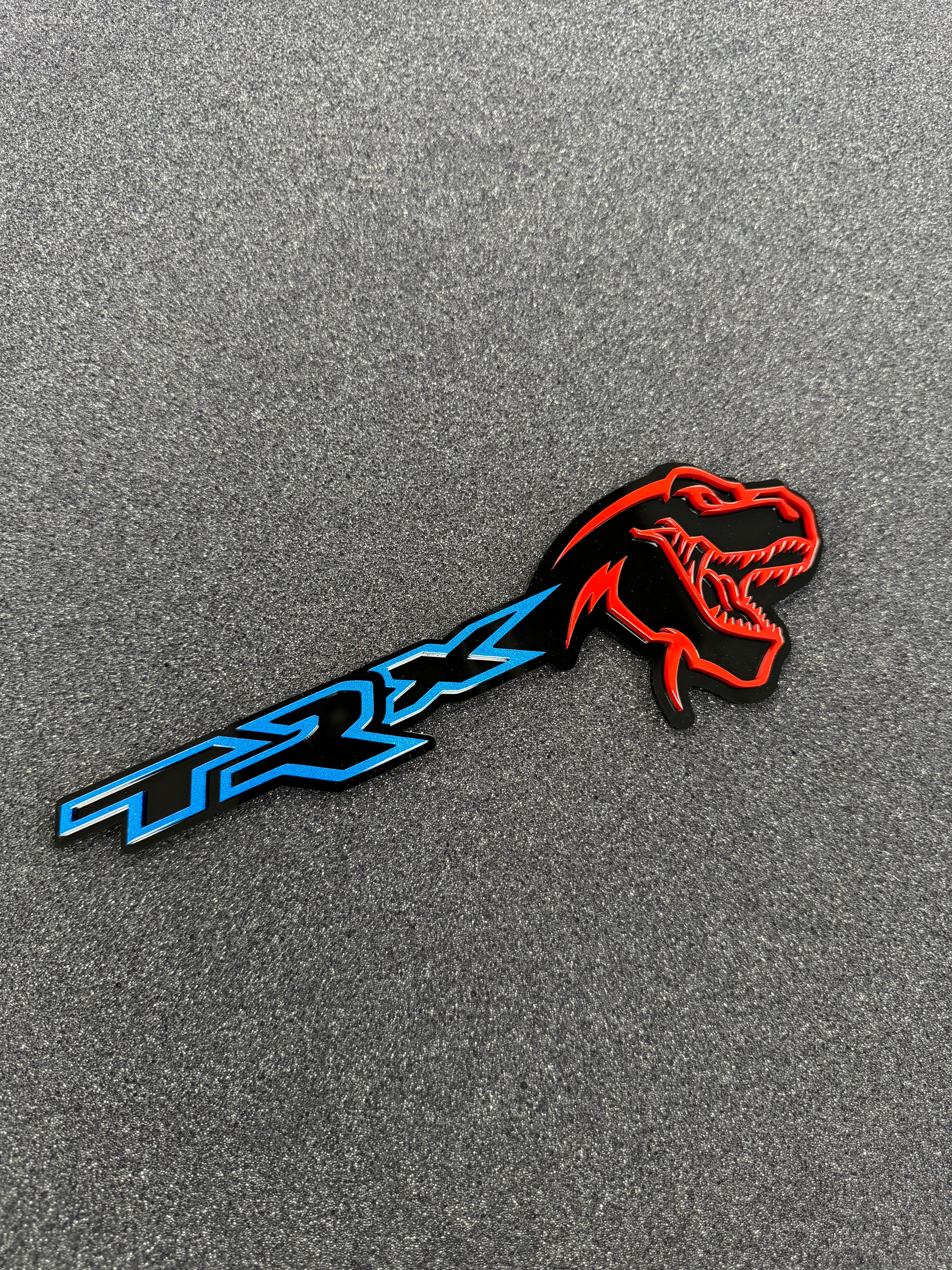 TREX/TRX combo badge single