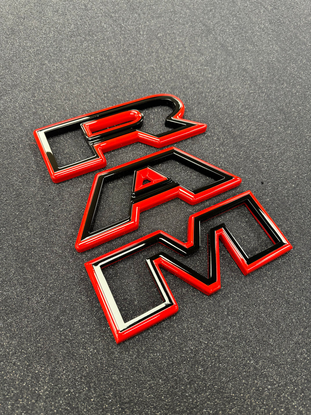 Color matched 3D RAM grille letters