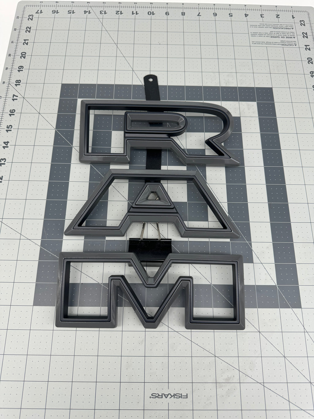 Color matched 3D RAM grille letters