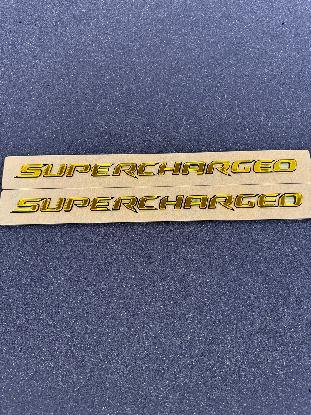 Trackhawk supercharged badge pair