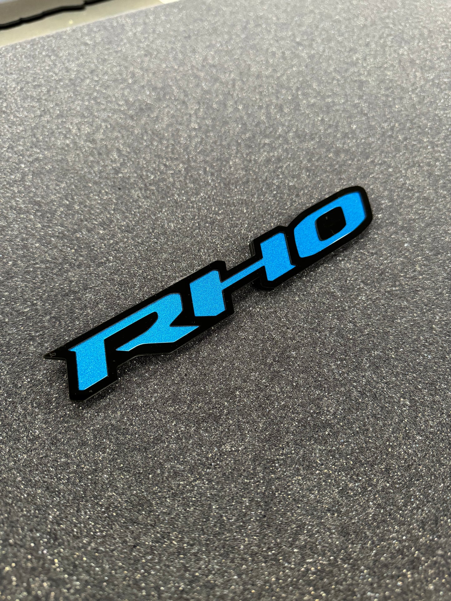 RHO small grille badge