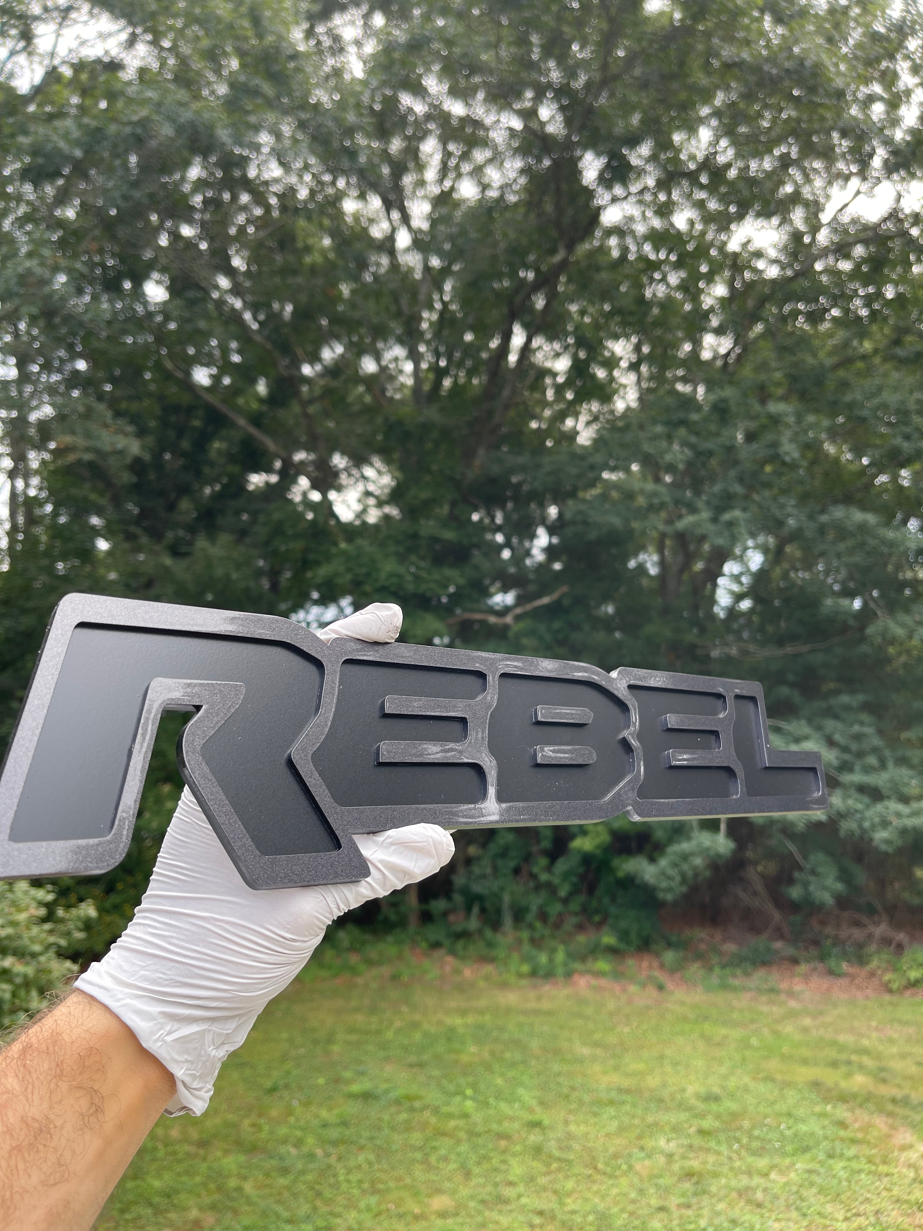 Rebel Grille badge replacement
