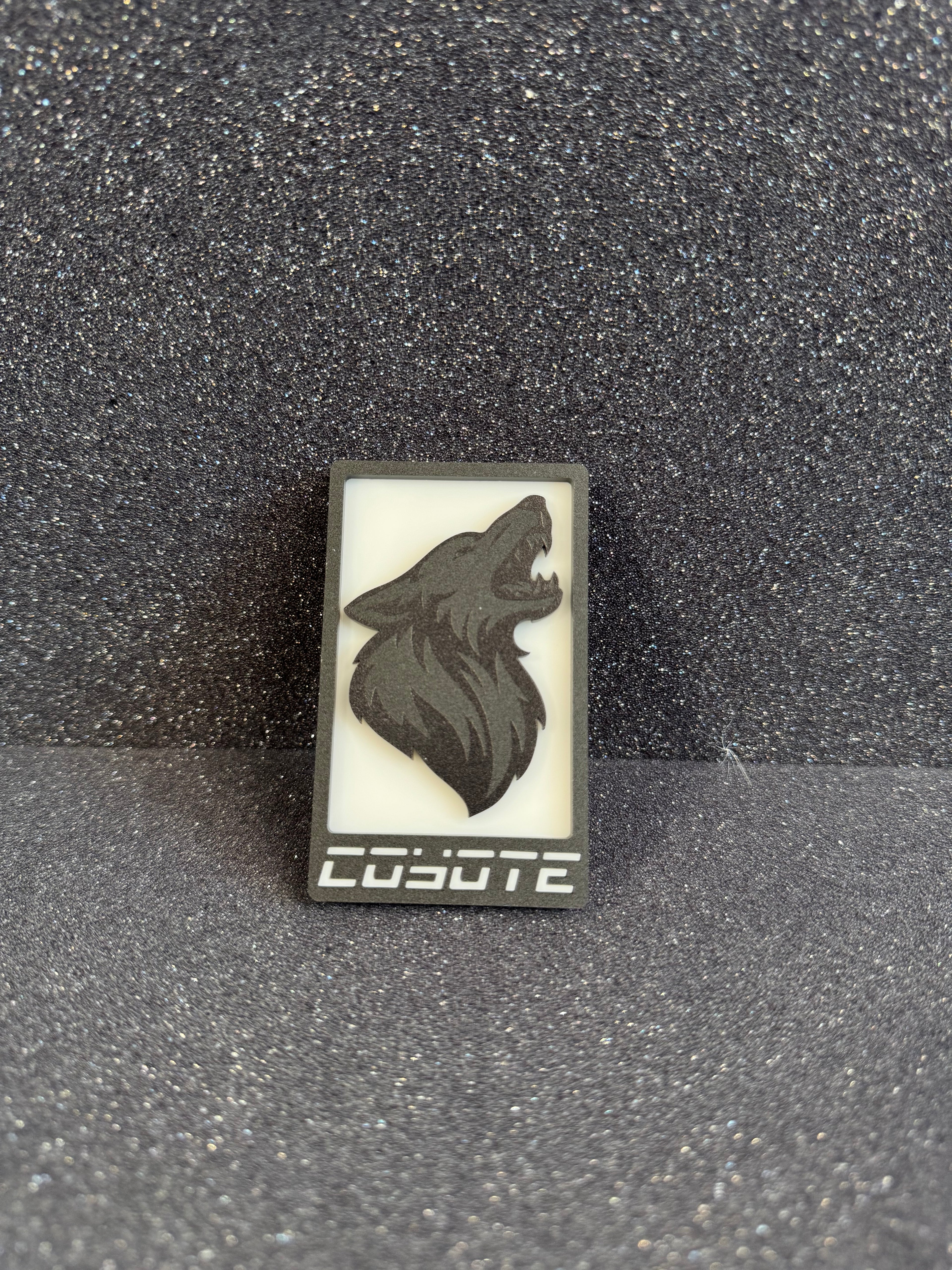 Coyote fender badge