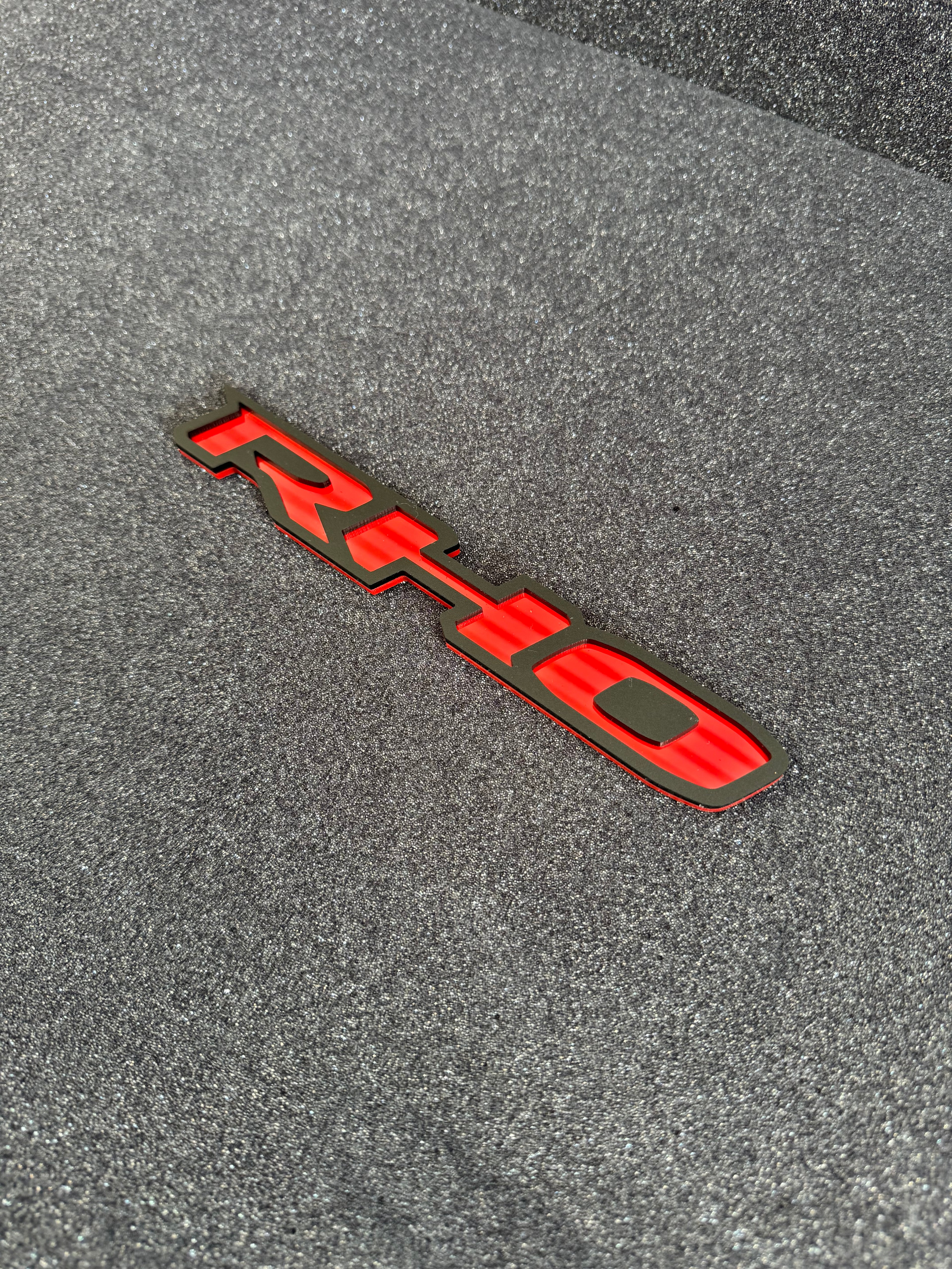 RHO small grille badge