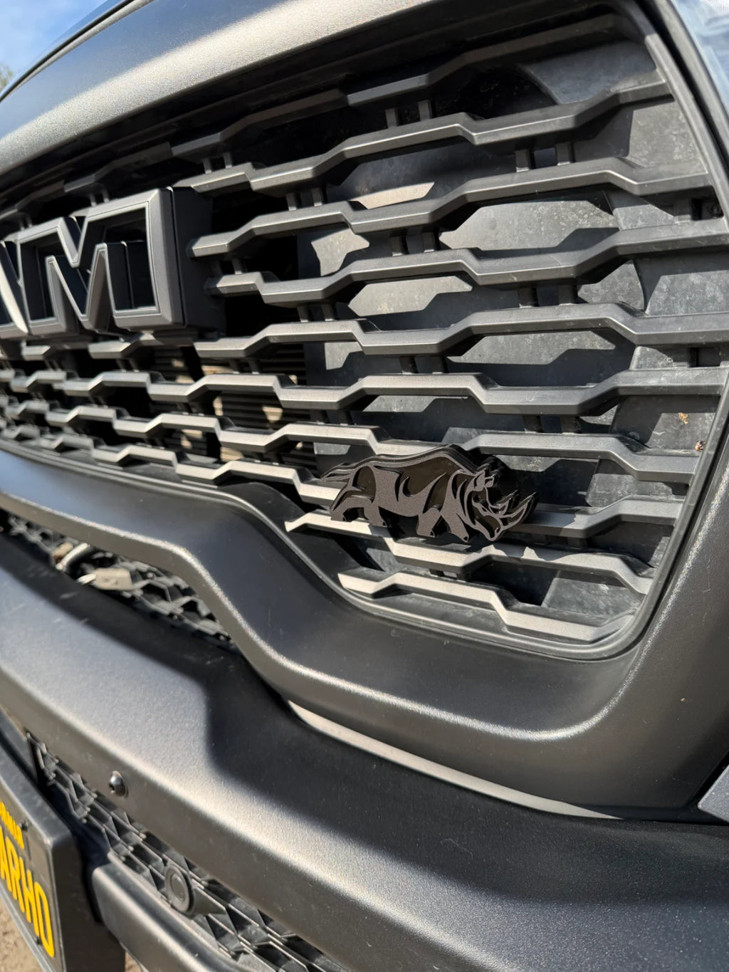 Rhino grille badge